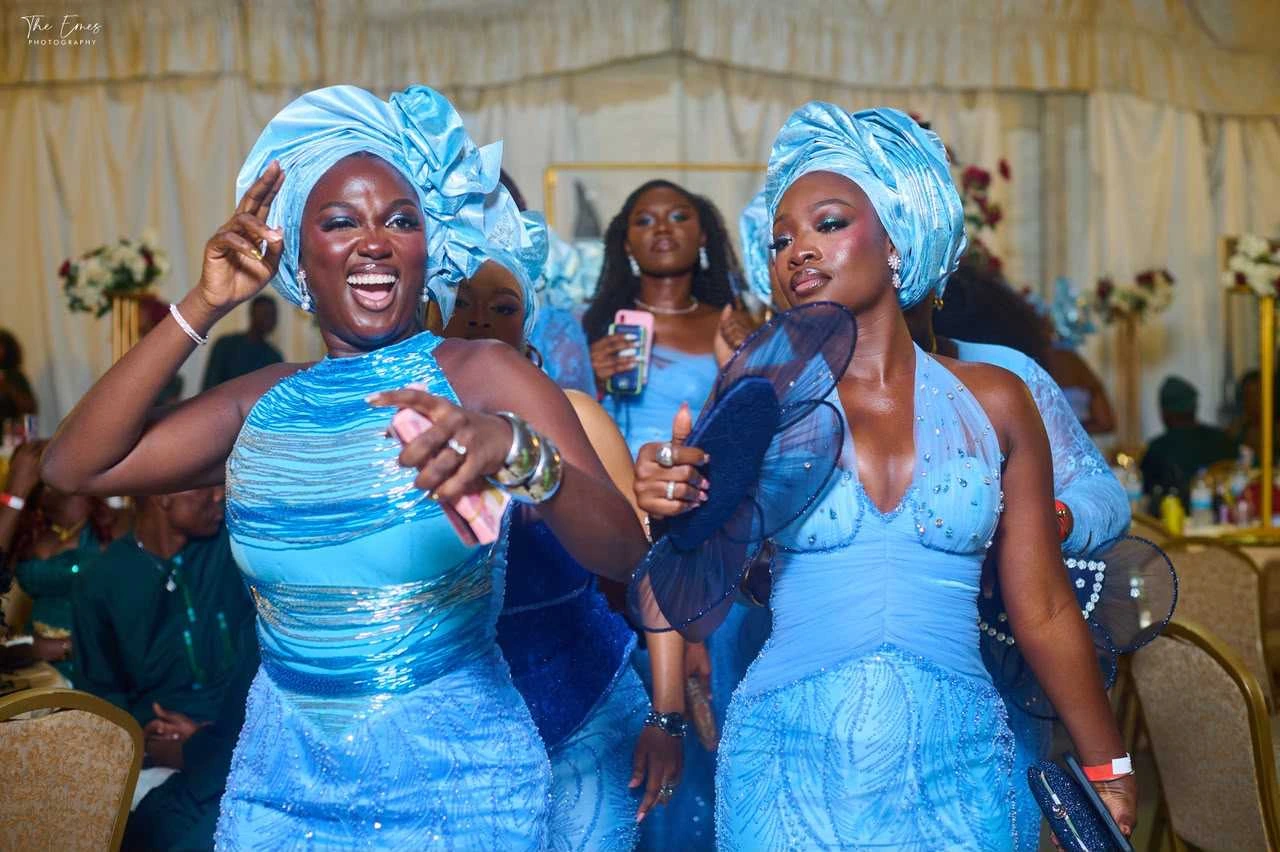 Guests celebrating in blue attire